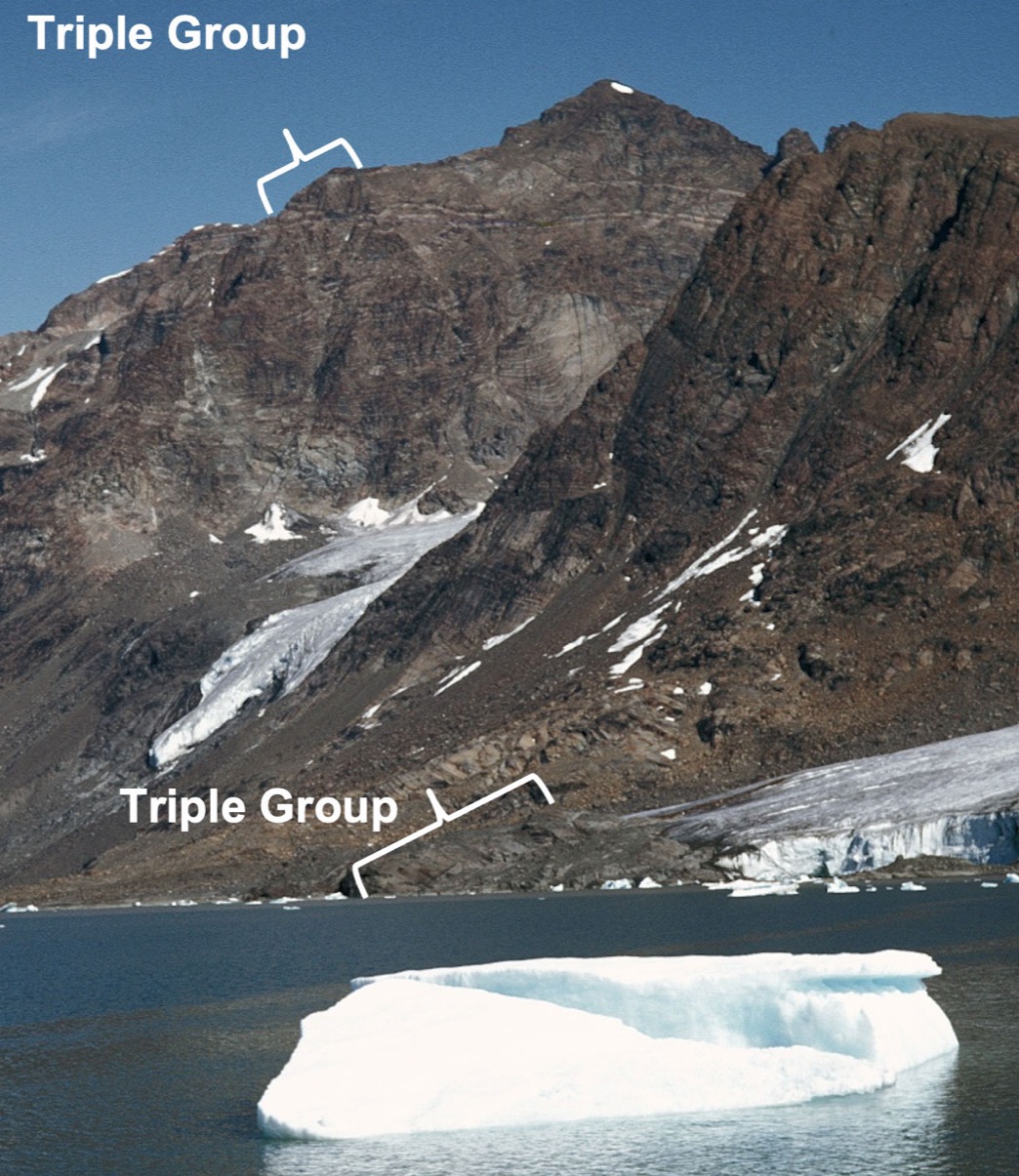Outcrop photograph with the Triple Group leucogabbro layers marked